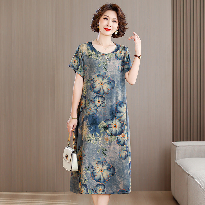 A middle-aged mother is wearing a cotton silk dress