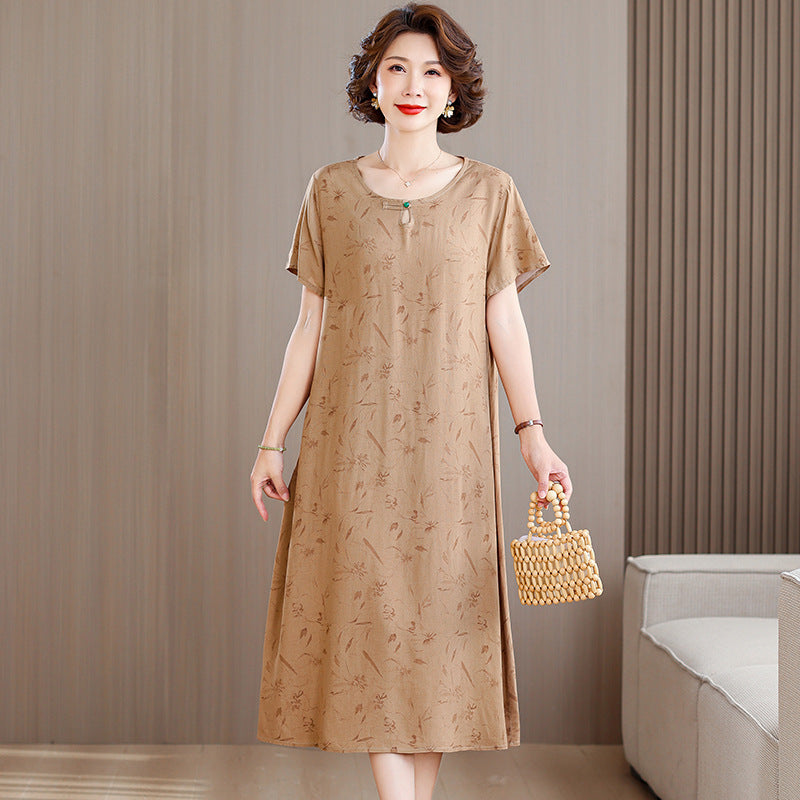 A middle-aged mother is wearing a cotton silk dress