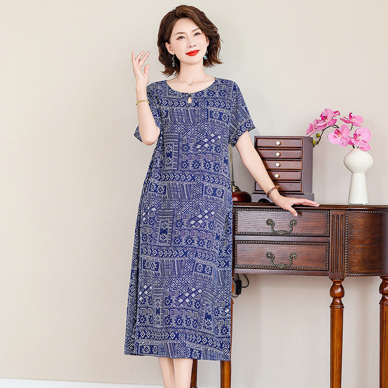 A middle-aged mother is wearing a cotton silk dress