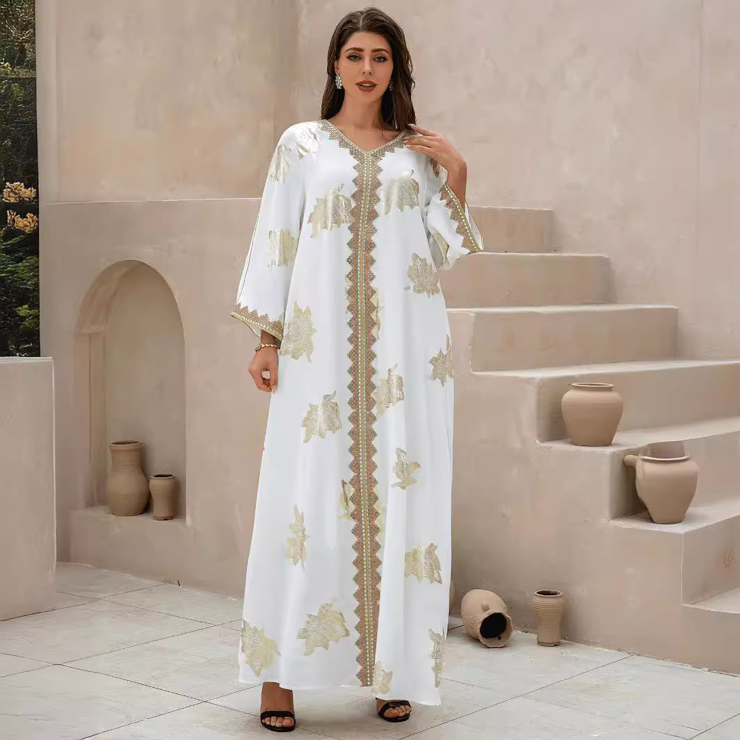 A golden-flowered Abaya robe