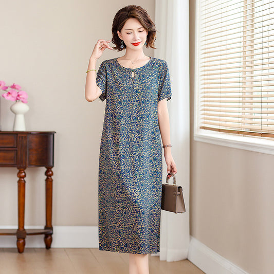 A middle-aged mother is wearing a cotton silk dress