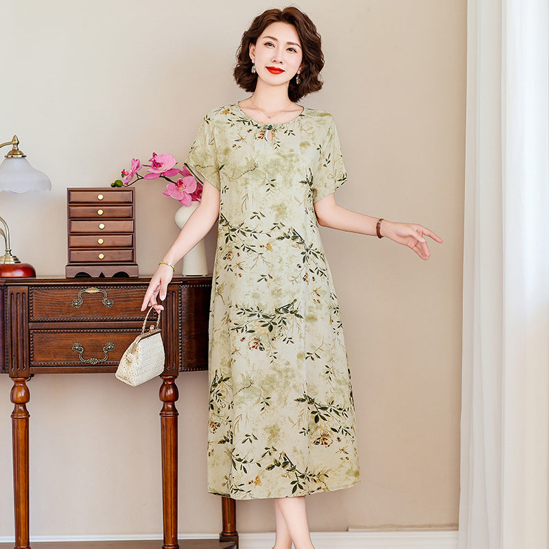 A middle-aged mother is wearing a cotton silk dress