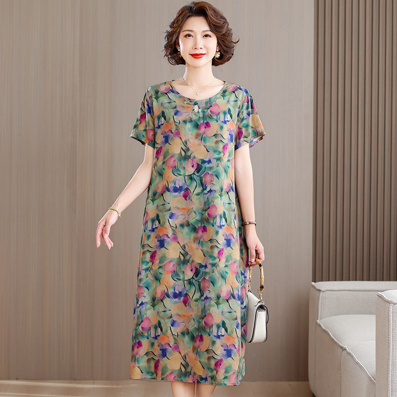 A middle-aged mother is wearing a cotton silk dress