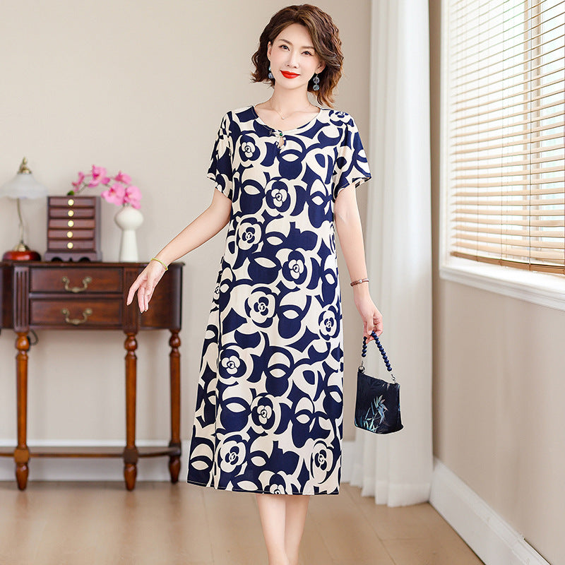 A middle-aged mother is wearing a cotton silk dress