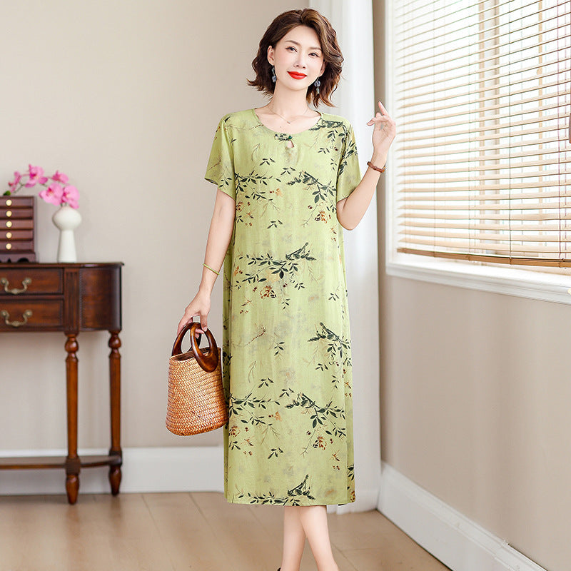 A middle-aged mother is wearing a cotton silk dress