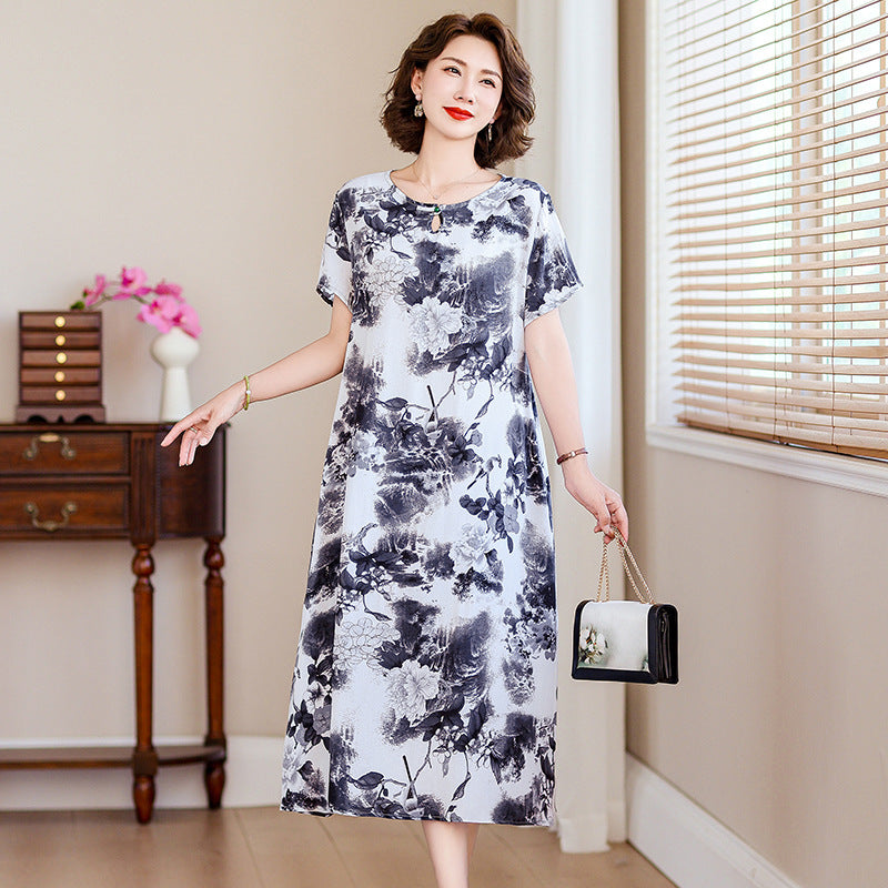 A middle-aged mother is wearing a cotton silk dress