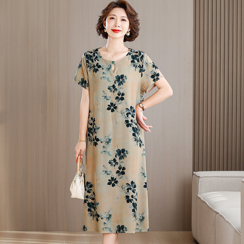 A middle-aged mother is wearing a cotton silk dress